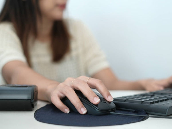Musearm: symptomer, årsaker, ergonomi og øvelser