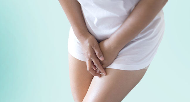 Kvinne har problemer med å holde på urinen